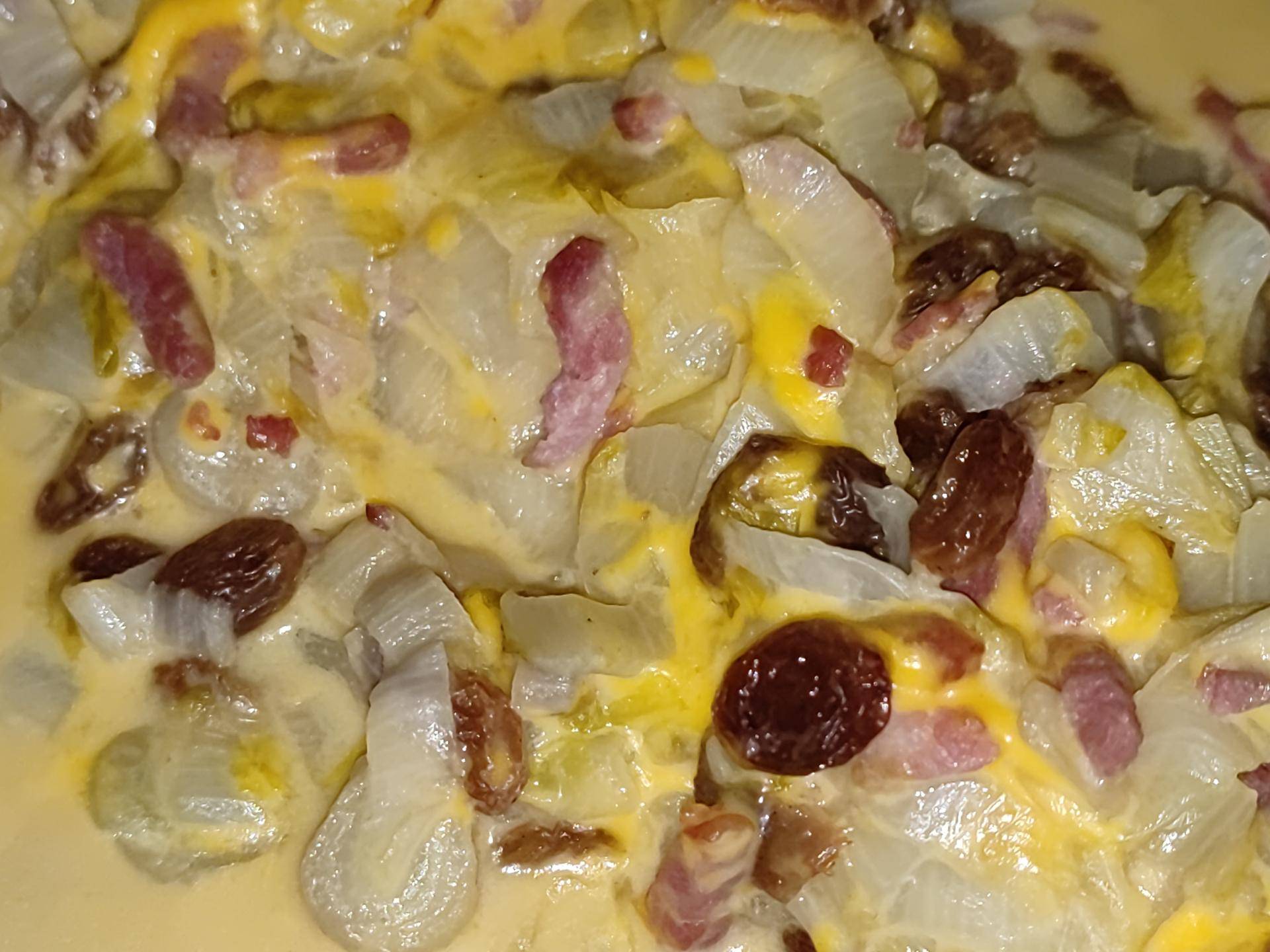 Endives braisées aux raisins, lardons et cheddar fondu - Recette Cookeo | Moulinex