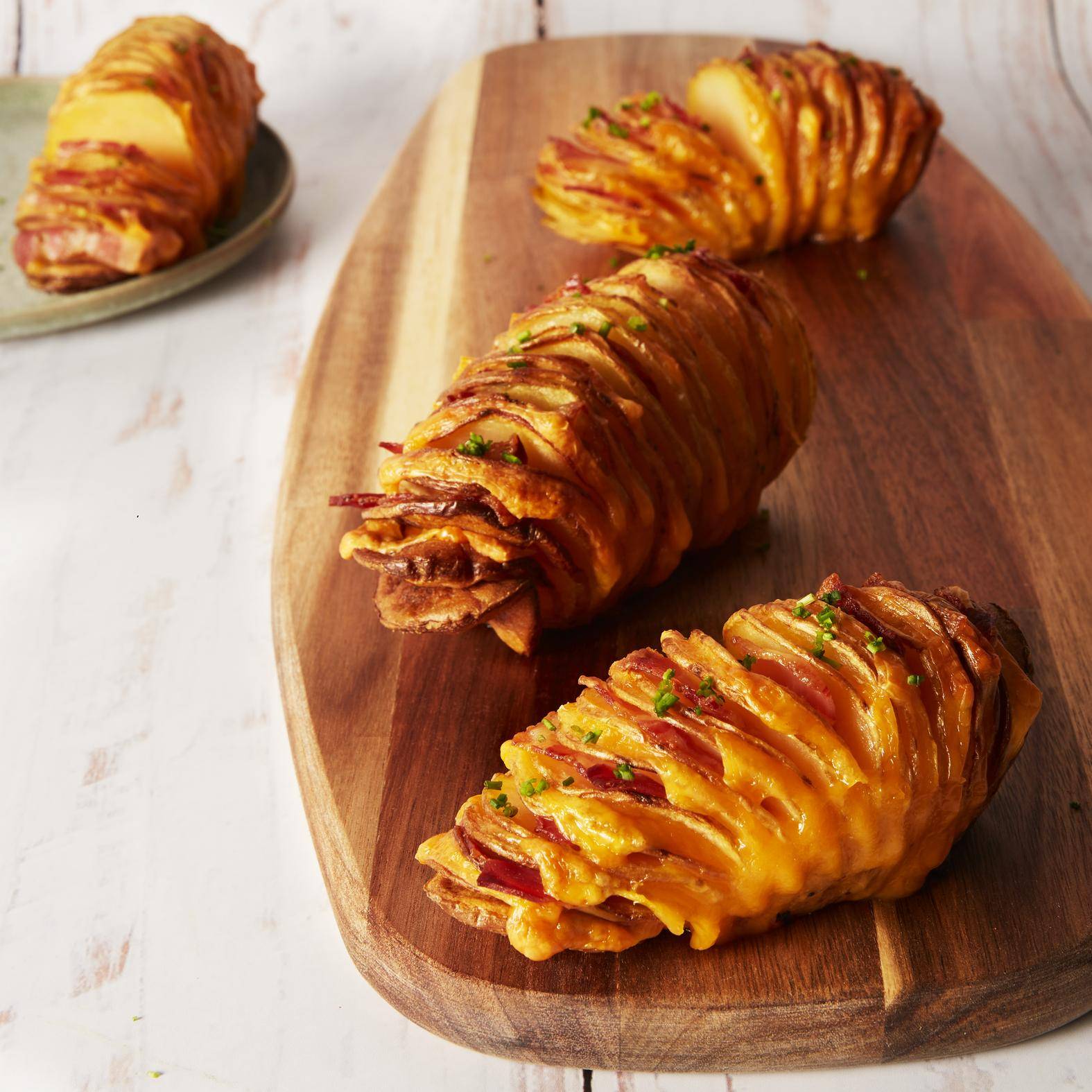 Pommes de terre hasselback farcies au lard et cheddar - Recepten Easy Fry Max | Moulinex