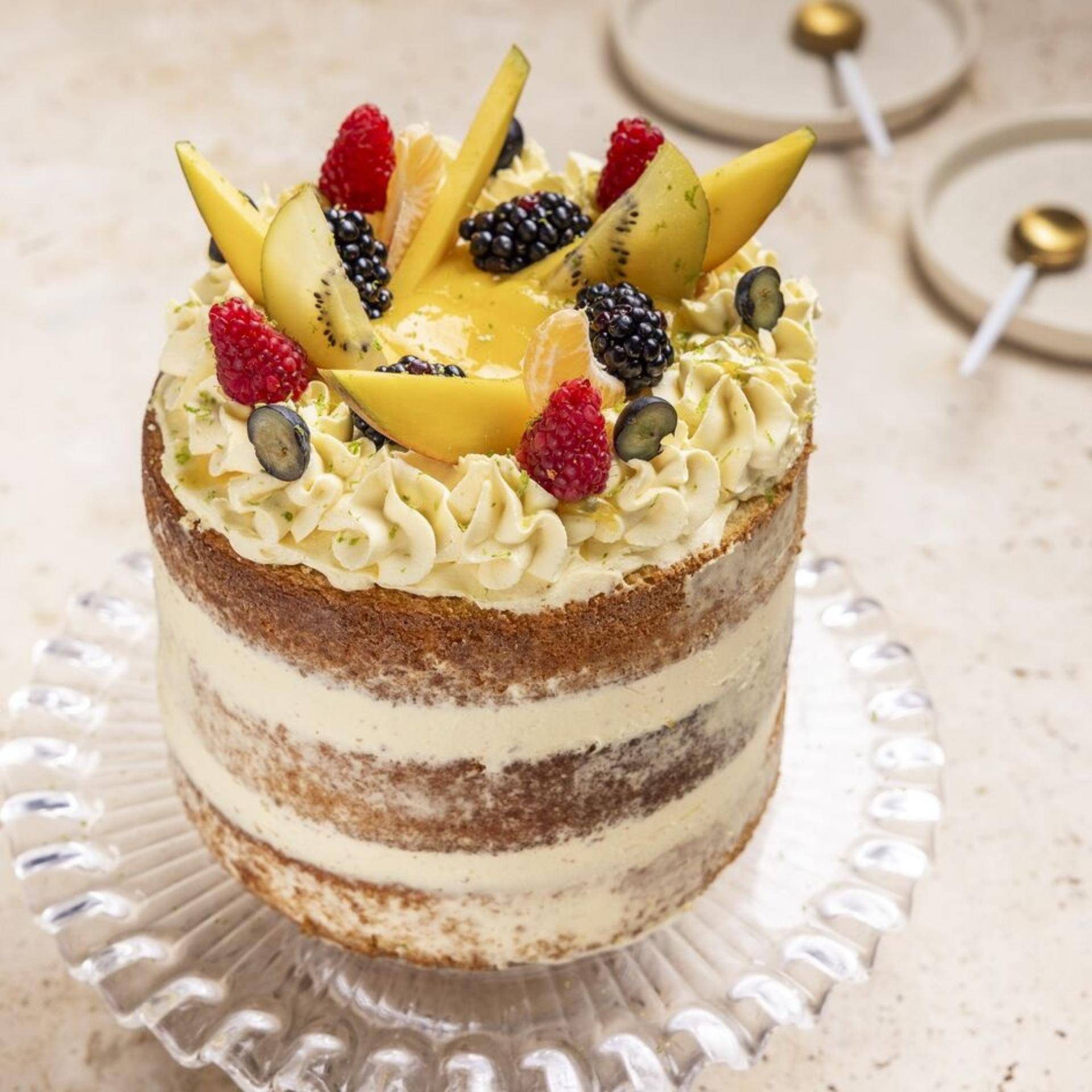 Layer cake coco, curd mangue, crème citron vert - Recette BAKE PARTNER | Moulinex